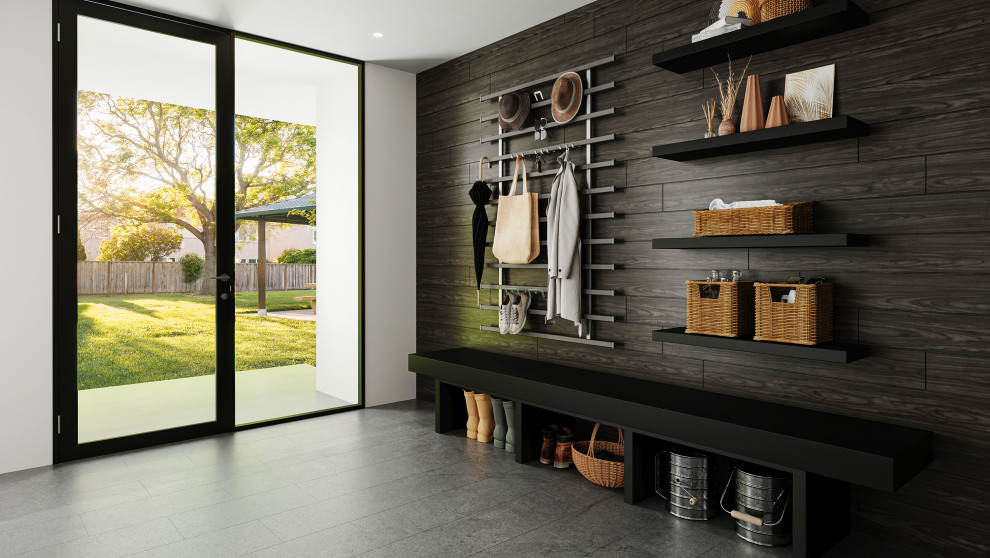 Cette image montre un petit hall d'entrée minimaliste avec un mur noir, une porte simple et une porte en verre.