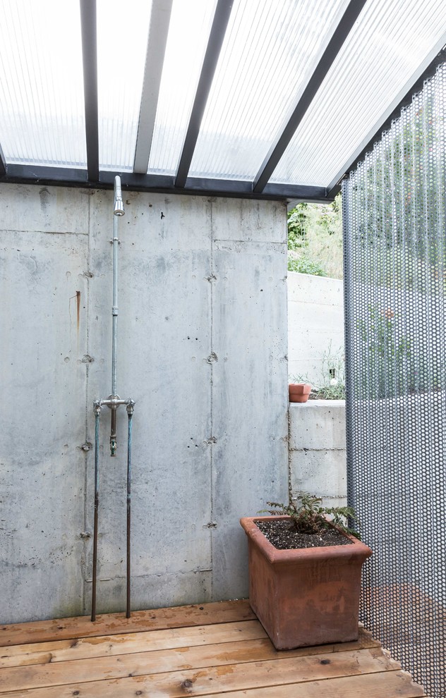 Inspiration for an industrial deck in Sacramento with an outdoor shower.