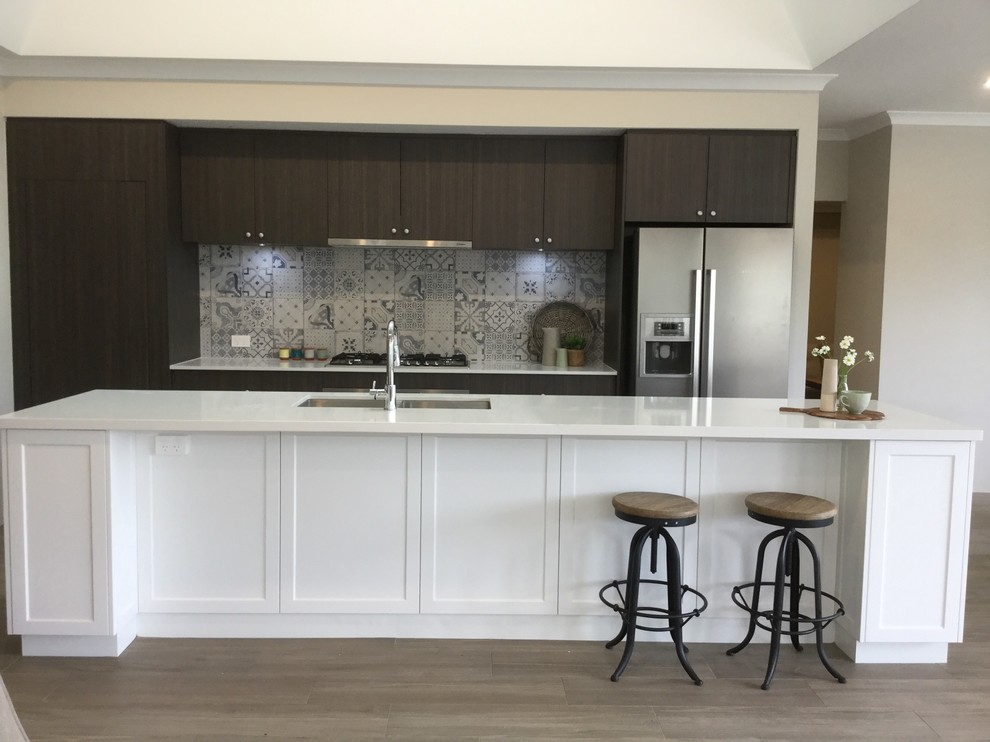 Design ideas for a large country galley open plan kitchen in Perth with a double-bowl sink, dark wood cabinets, quartz benchtops, ceramic splashback, stainless steel appliances, ceramic floors, with island, brown floor and shaker cabinets.