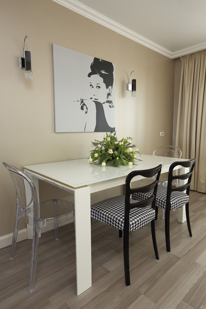 Design ideas for a small contemporary separate dining room in Other with light hardwood floors.