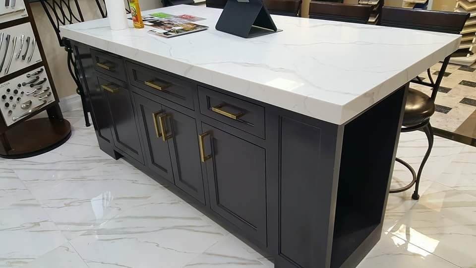 Kitchen - transitional marble floor kitchen idea in Boston with an undermount sink, gray cabinets, quartz countertops and stainless steel appliances