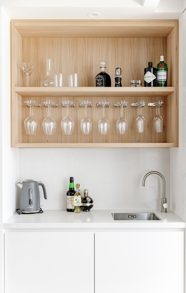 Design ideas for a beach style home bar in Newcastle - Maitland.