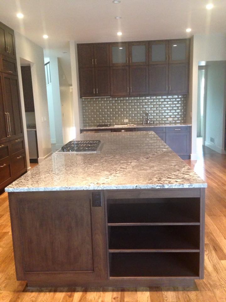 Example of a transitional kitchen design in Denver