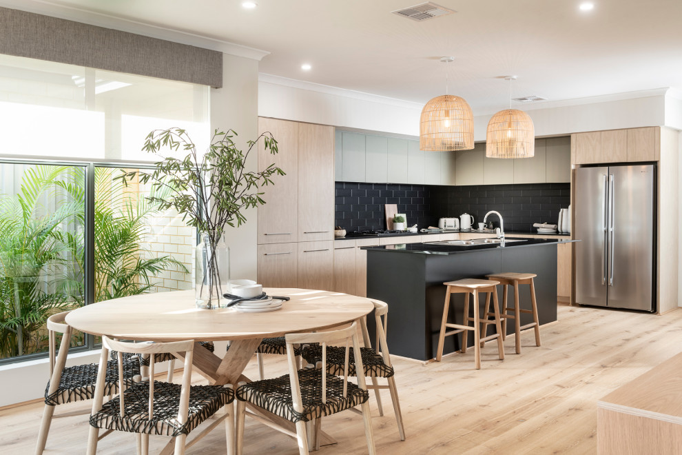 Design ideas for a contemporary kitchen/dining combo in Perth with white walls, light hardwood floors, no fireplace and beige floor.