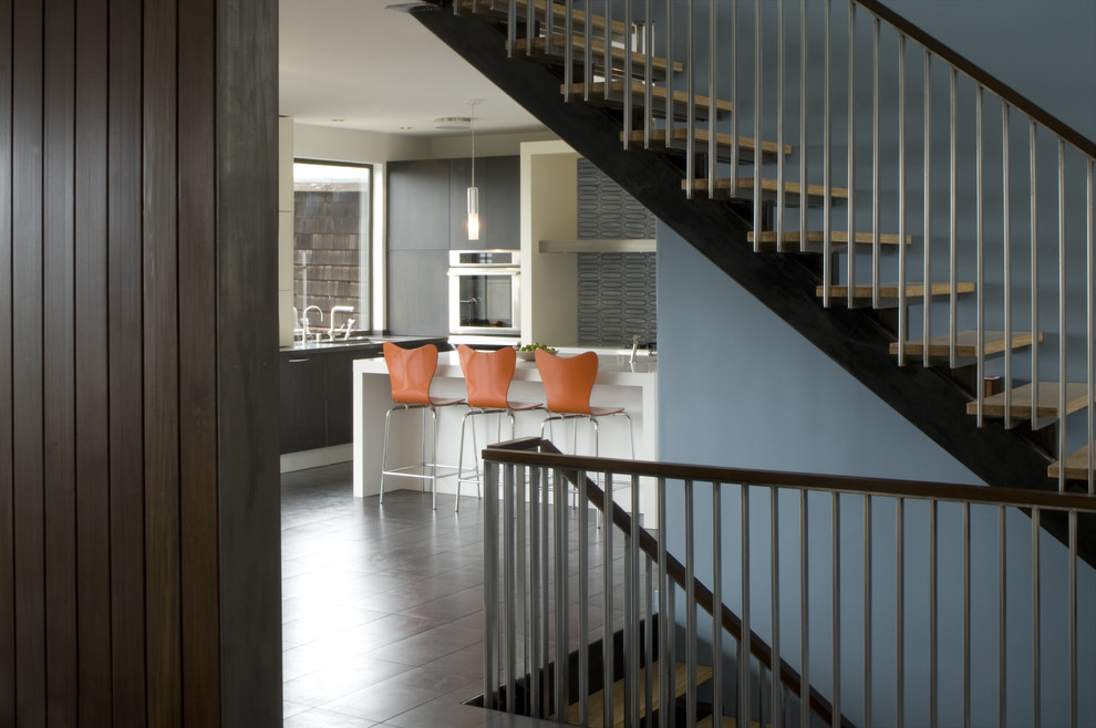 Design ideas for a modern wood straight staircase in San Francisco with open risers.