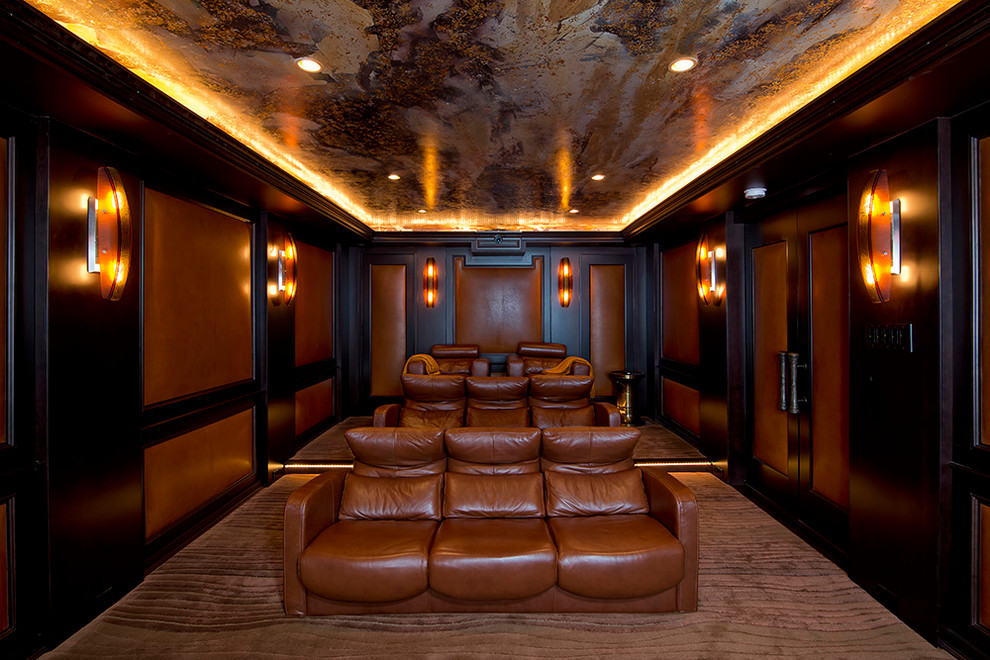 Mid-sized traditional enclosed home theatre in DC Metro with a wall-mounted tv.
