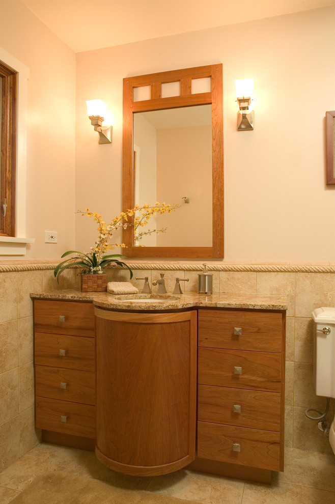 Photo of a small arts and crafts bathroom in Sacramento with an alcove tub, a shower/bathtub combo, a two-piece toilet, porcelain tile, white walls, porcelain floors and an undermount sink.
