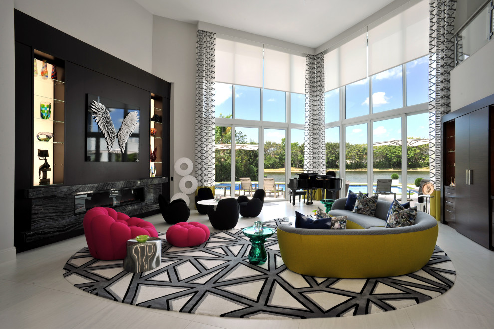 Inspiration for a contemporary open concept living room in Miami with porcelain floors and a wall-mounted tv.