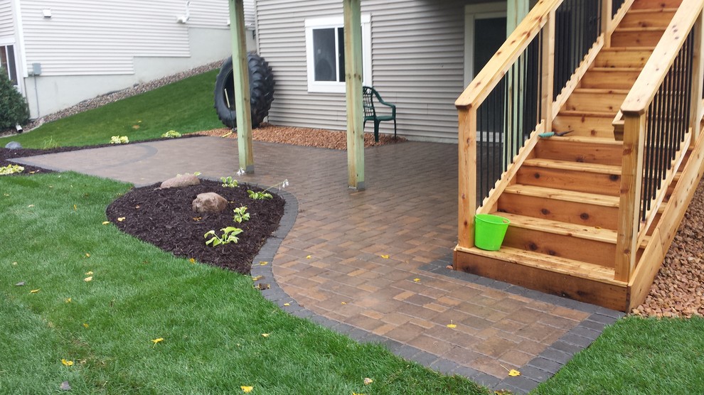 Patio in Shakopee under a deck Traditional Minneapolis by NS