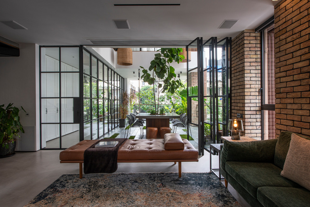 Inspiration for an industrial living room remodel in Mumbai