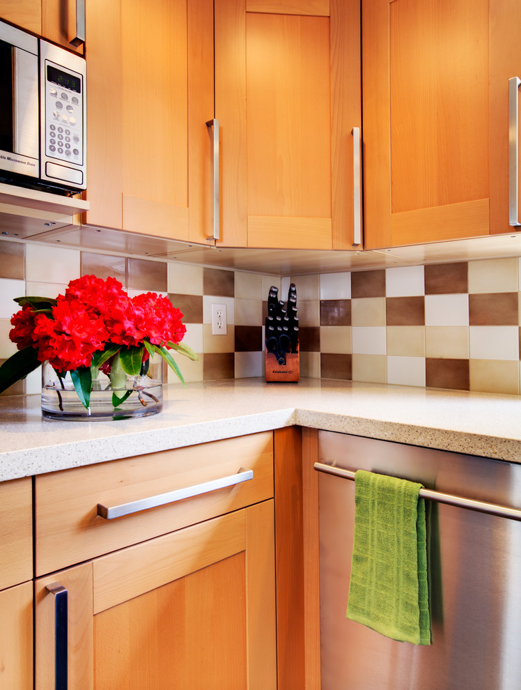 Example of a transitional kitchen design in Seattle