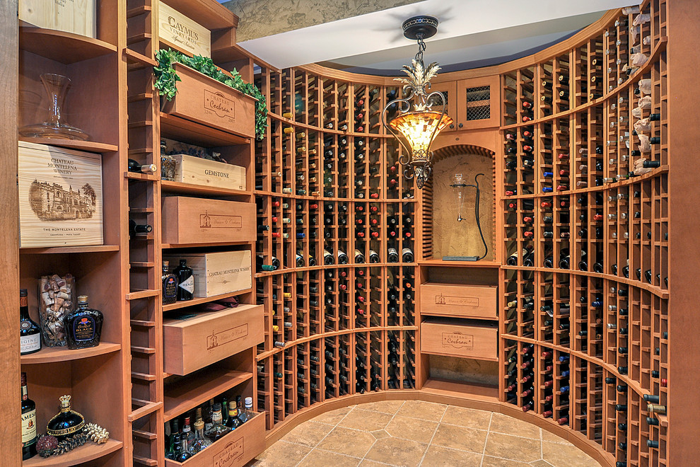 Inspiration for a large country wine cellar in Nashville with porcelain floors and storage racks.