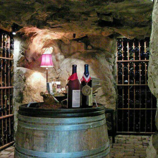 Inspiration for a large tropical wine cellar in Charlotte.