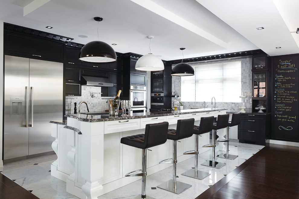 This is an example of a large contemporary kitchen in Montreal with shaker cabinets, granite benchtops, multi-coloured splashback, mosaic tile splashback, stainless steel appliances and with island.