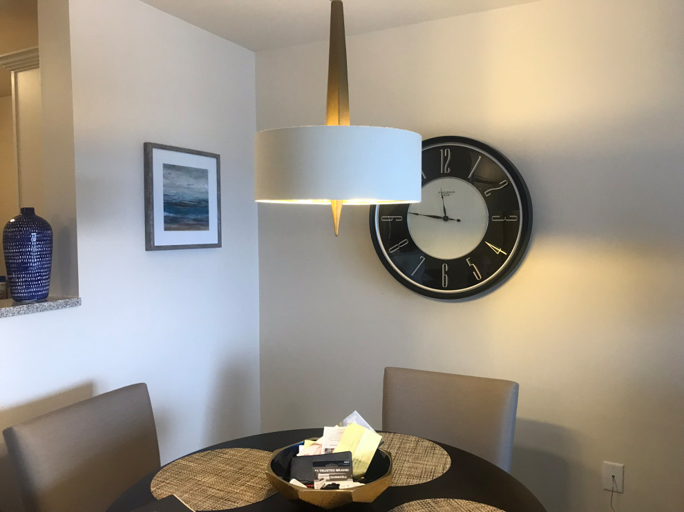 Inspiration for a small transitional carpeted and beige floor kitchen/dining room combo remodel with white walls