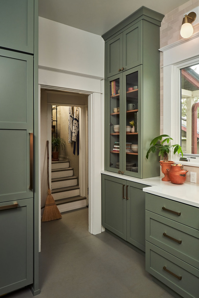 Mid-sized transitional l-shaped beige floor eat-in kitchen photo in Portland with a farmhouse sink, shaker cabinets, green cabinets, quartzite countertops, beige backsplash, ceramic backsplash, no island and white countertops