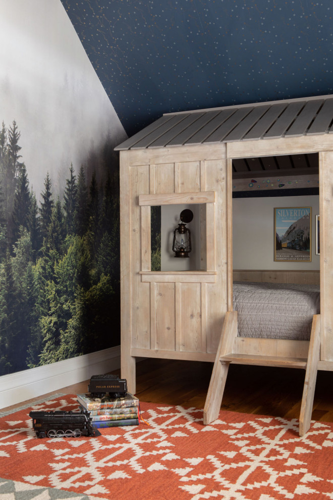 This is an example of a rustic kids' bedroom in Denver with a feature wall.