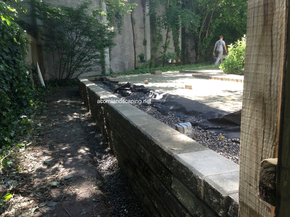 Example of a small classic backyard concrete paver patio design in Other