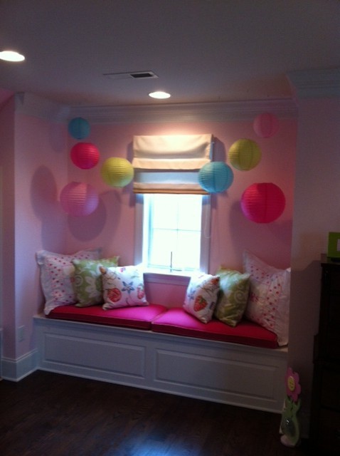 Example of a mid-sized eclectic dark wood floor bedroom design in Philadelphia with pink walls
