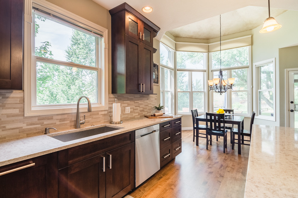 Transitional home design photo in Denver