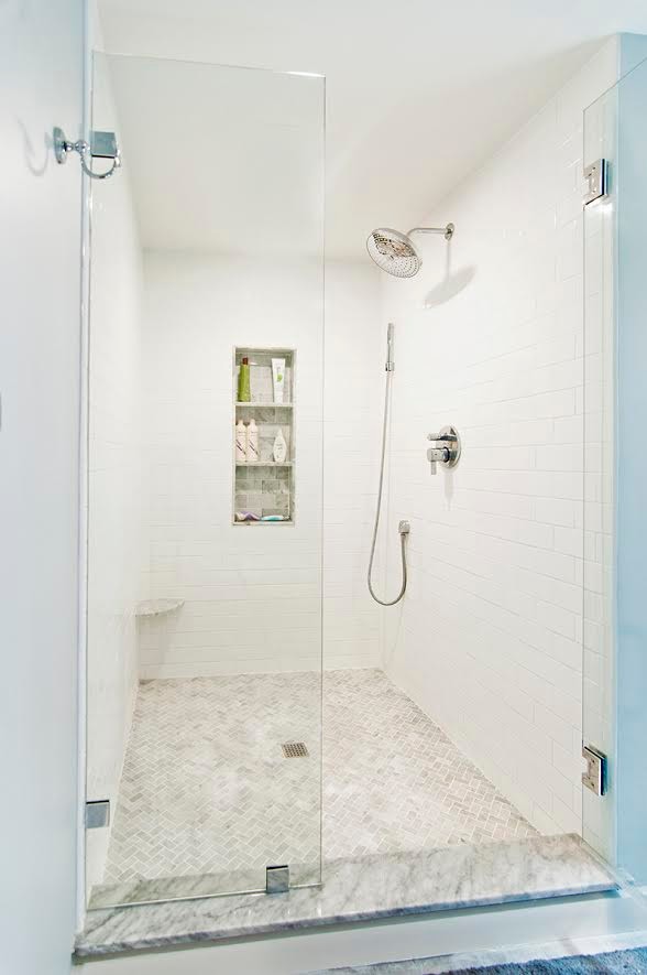 Inspiration for a large transitional master white tile and subway tile ceramic tile and gray floor alcove shower remodel in Boston with recessed-panel cabinets, white cabinets, gray walls, an undermount sink, laminate countertops and a hinged shower door