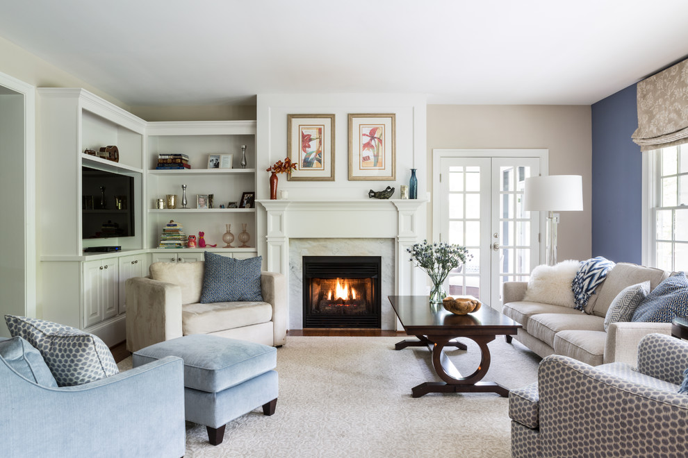 Inspiration for a timeless family room remodel in DC Metro with beige walls, a standard fireplace and a media wall