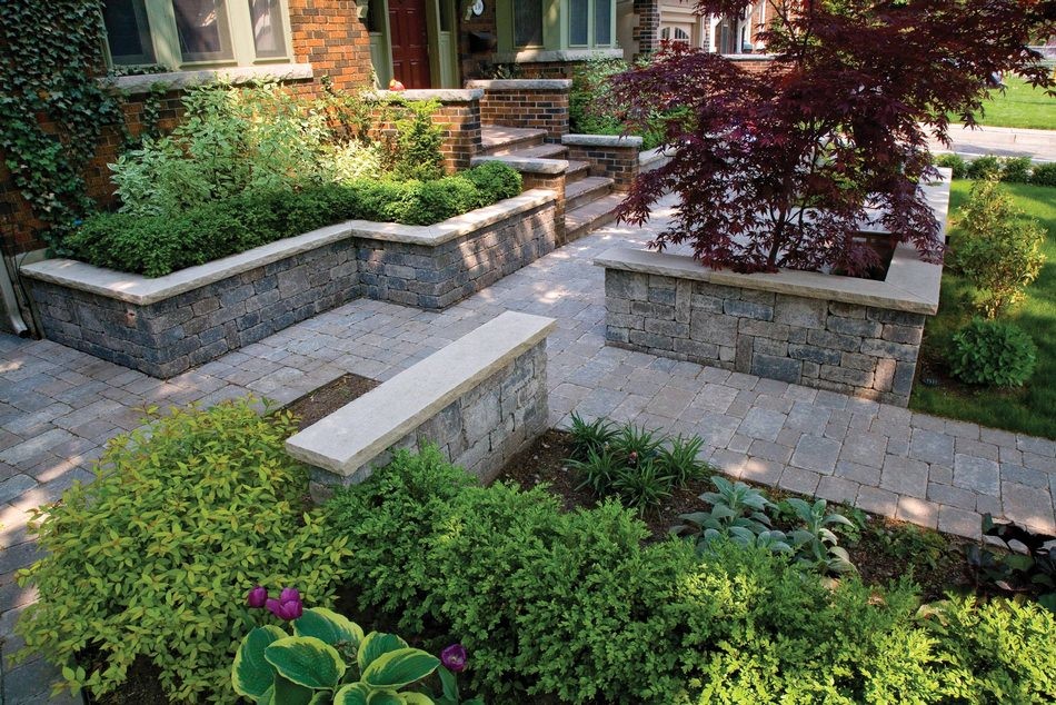 Unilock walkway. Granite Wall with Flagstone Treads to tie all together.