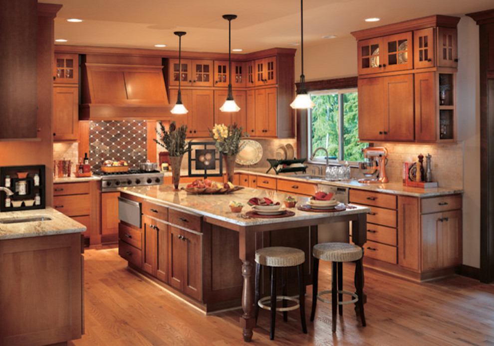 Mid-sized transitional u-shaped medium tone wood floor and brown floor open concept kitchen photo in Toronto with an undermount sink, shaker cabinets, medium tone wood cabinets, granite countertops, beige backsplash, ceramic backsplash, stainless steel appliances and an island