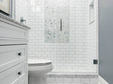 Transitional Bathroom by Redstart Construction, Inc.