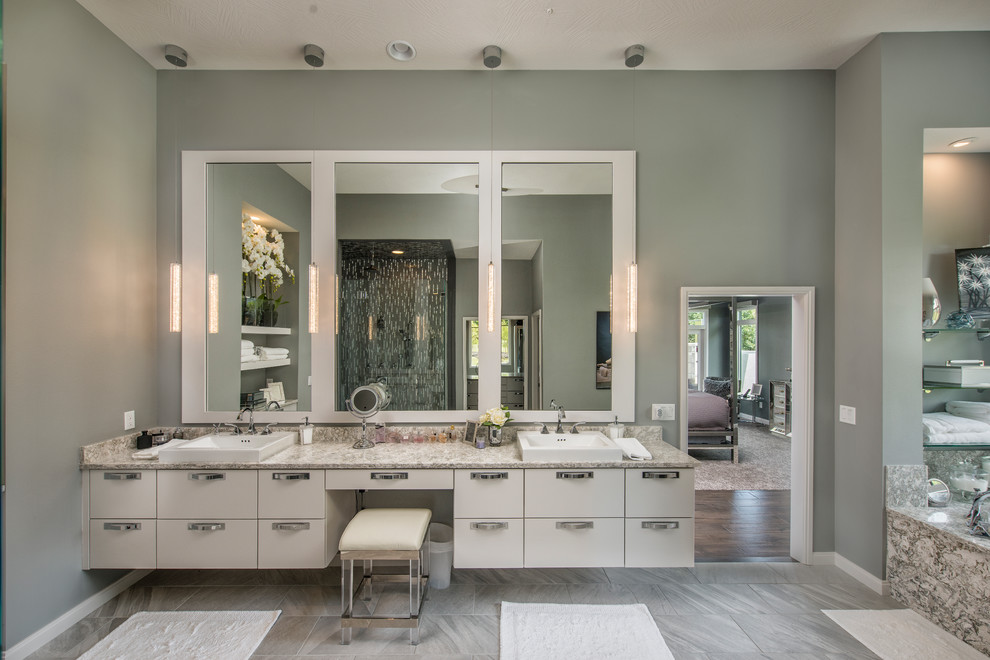 Design ideas for a contemporary master bathroom in Other with white cabinets.