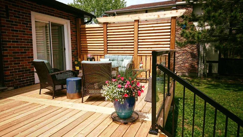 Small country backyard deck in Other.