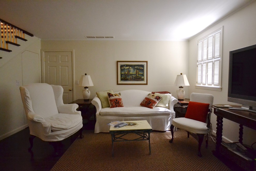 Inspiration for a dark wood floor and brown floor basement remodel with white walls