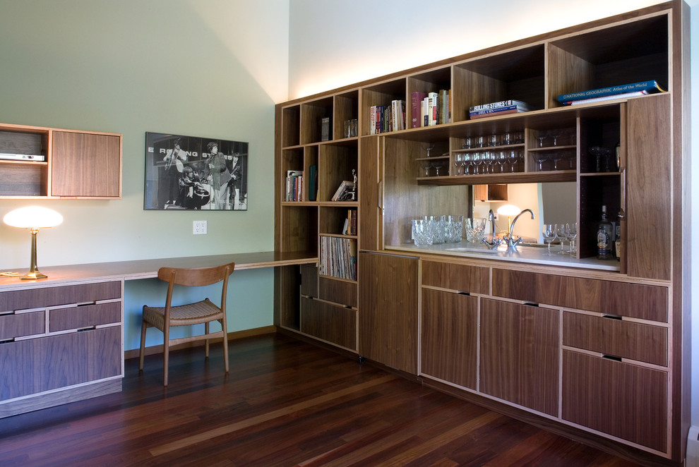 Inspiration for a midcentury study room in Seattle with a built-in desk.