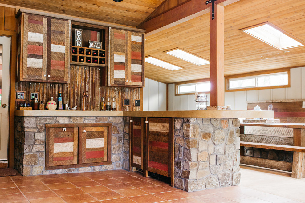 Inspiration for a mid-sized rustic l-shaped ceramic tile and beige floor eat-in kitchen remodel with an integrated sink, shaker cabinets, medium tone wood cabinets, brown backsplash, wood backsplash and a peninsula