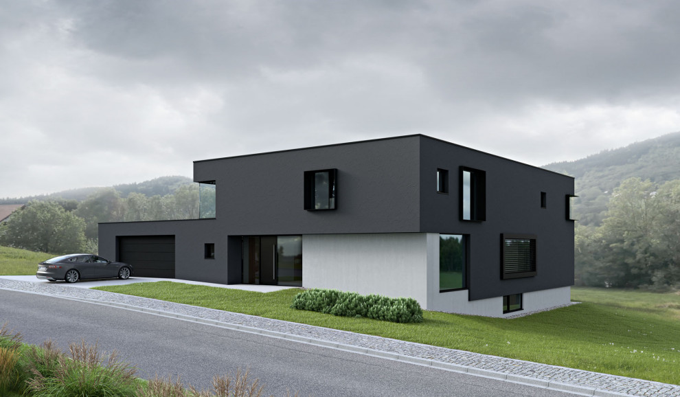 Mittelgroßes, Zweistöckiges Modernes Haus mit Putzfassade und grauer Fassadenfarbe in München