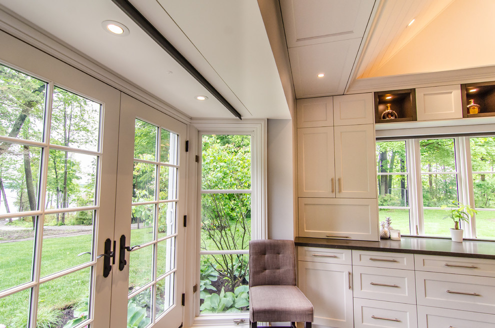 Example of a transitional kitchen design in Toronto