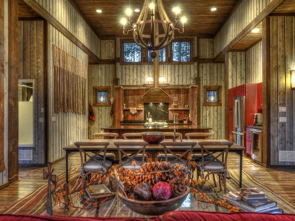 Inspiration for a huge rustic medium tone wood floor open concept kitchen remodel in Minneapolis with an undermount sink, red cabinets, gray backsplash, stainless steel appliances and an island
