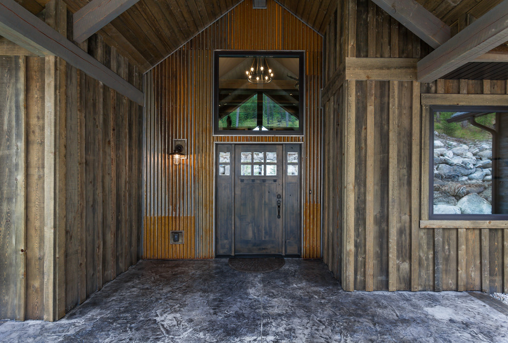 Rustic brown one-story mixed siding house exterior idea