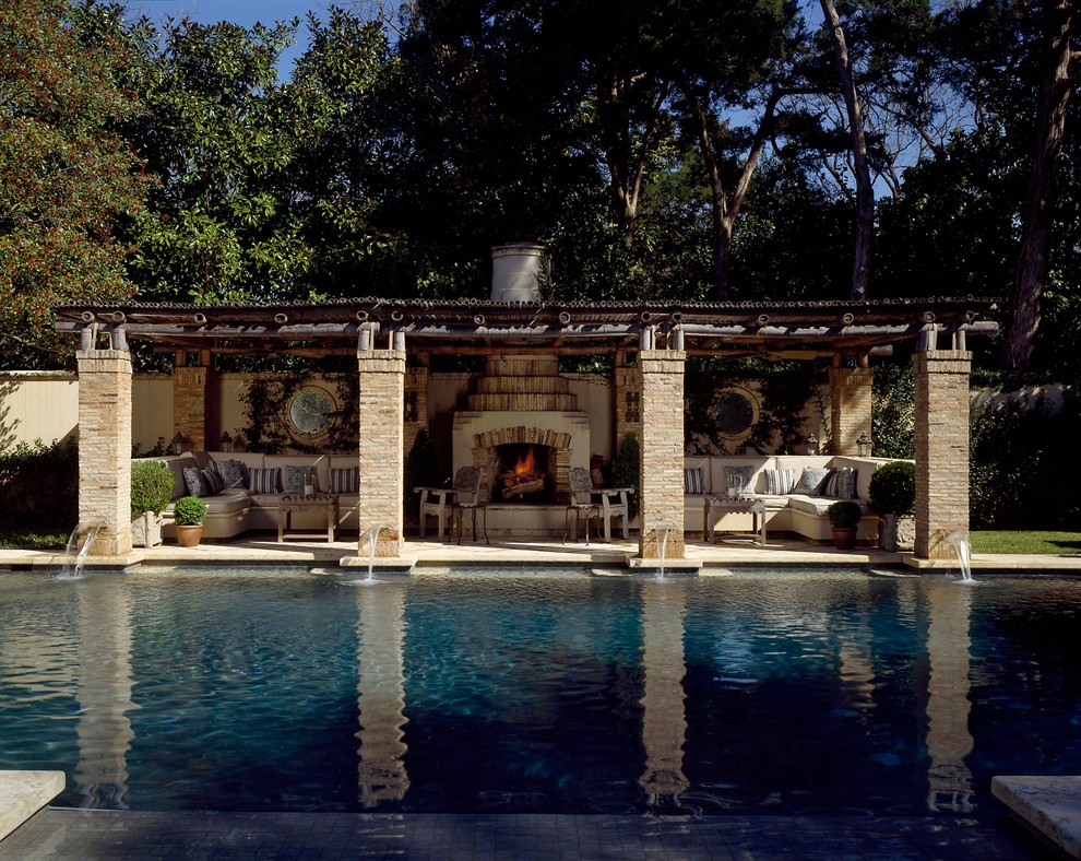 This is an example of a mediterranean custom-shaped pool in Dallas.