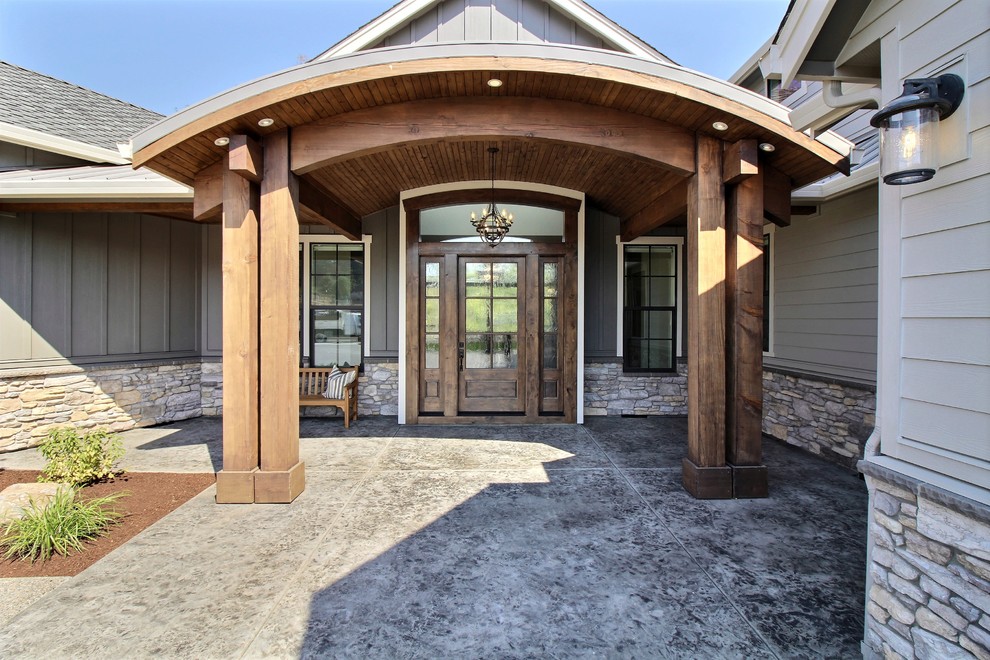 Huge craftsman gray three-story mixed siding exterior home idea in Portland with a shingle roof