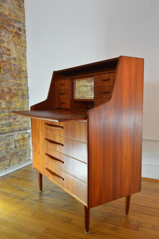 This is an example of a mid-sized midcentury home office in Other with a freestanding desk.