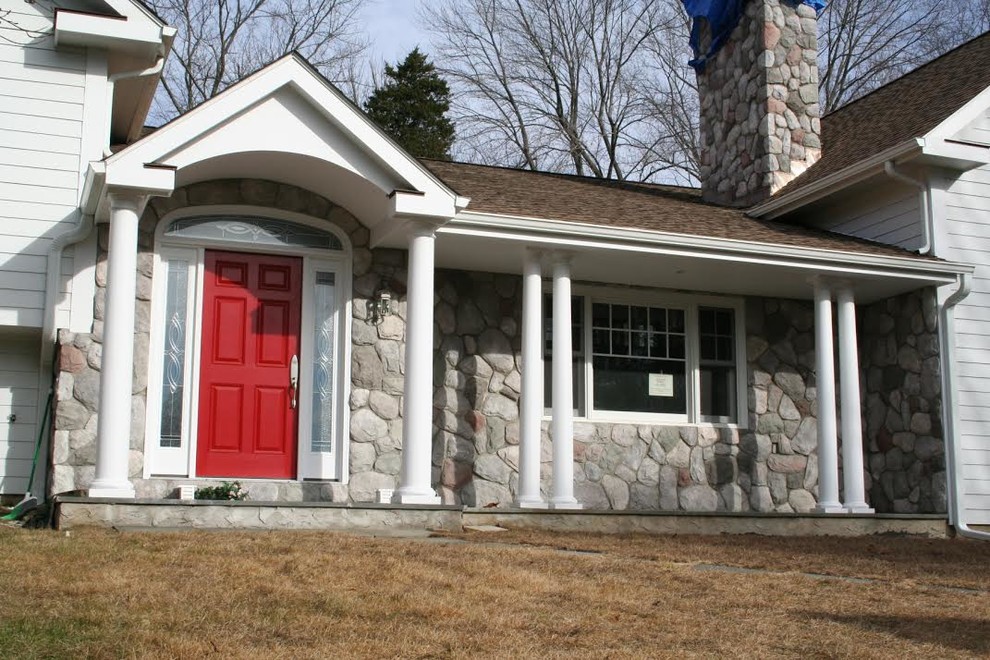 Photo of a mid-sized traditional one-storey white exterior in New York with mixed siding.