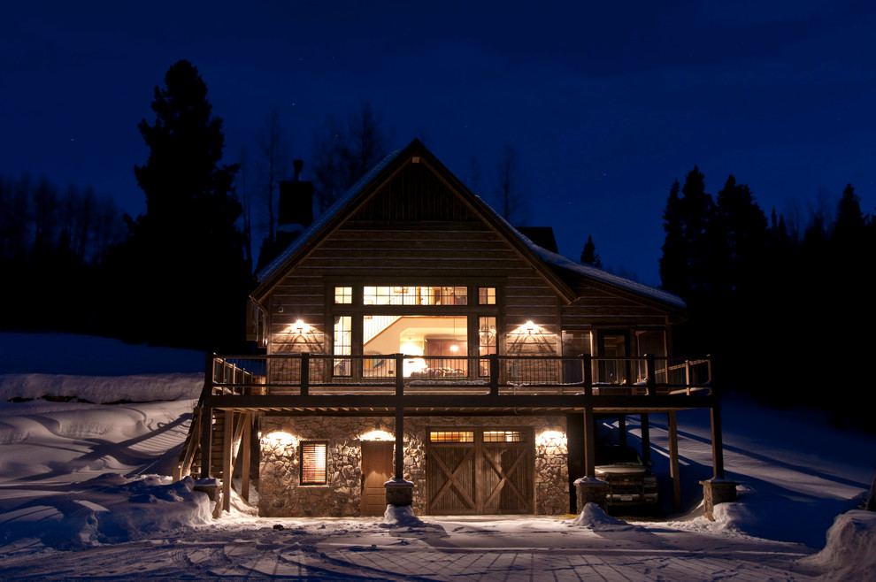 Example of a mid-sized mountain style gray three-story mixed siding exterior home design in Denver