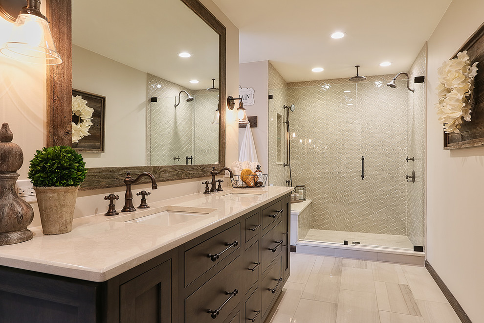 Inspiration for a large transitional master bathroom in Chicago with beaded inset cabinets, grey cabinets, a freestanding tub, an alcove shower, a two-piece toilet, beige tile, ceramic tile, beige walls, porcelain floors, an undermount sink and marble benchtops.