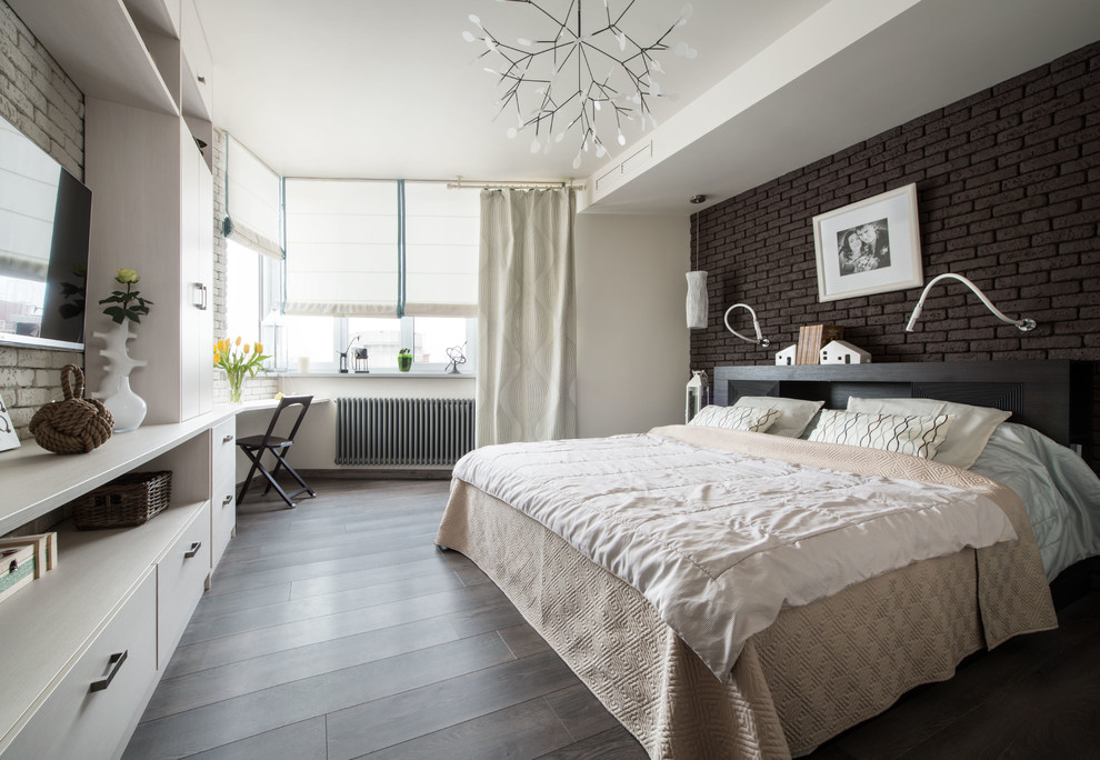 This is an example of a contemporary master bedroom in Moscow with white walls and dark hardwood floors.