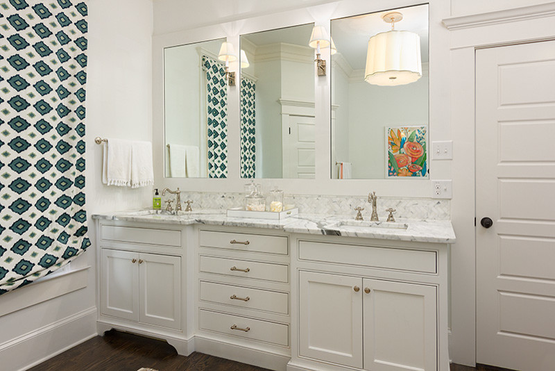 Design ideas for a large transitional master bathroom in Atlanta with shaker cabinets, white cabinets, a drop-in tub, a corner shower, gray tile, white tile, stone tile, white walls, dark hardwood floors, an undermount sink, marble benchtops, brown floor and a hinged shower door.