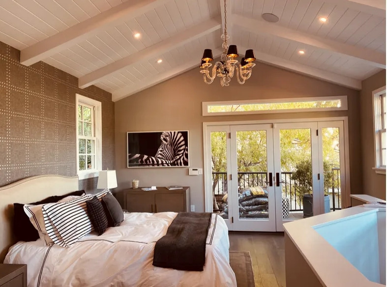 Example of a country bedroom design in Los Angeles