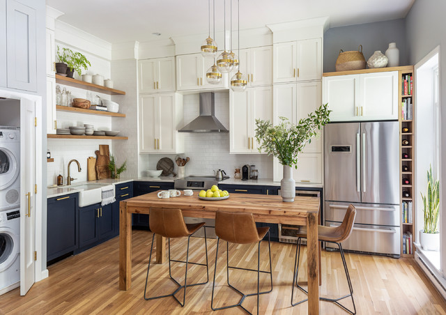 Two-Tone Cabinets and an Open Wood Island in a Sunny Kitchen
