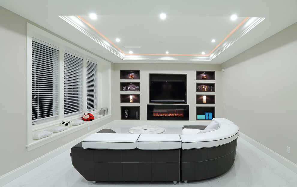 Photo of a modern home theatre in Vancouver with grey walls, ceramic floors and a built-in media wall.