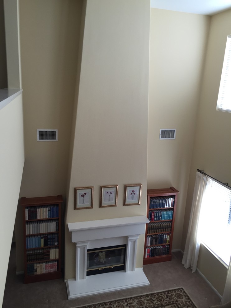 What do I hang over my fireplace in a large room with 20 foot ceiling?